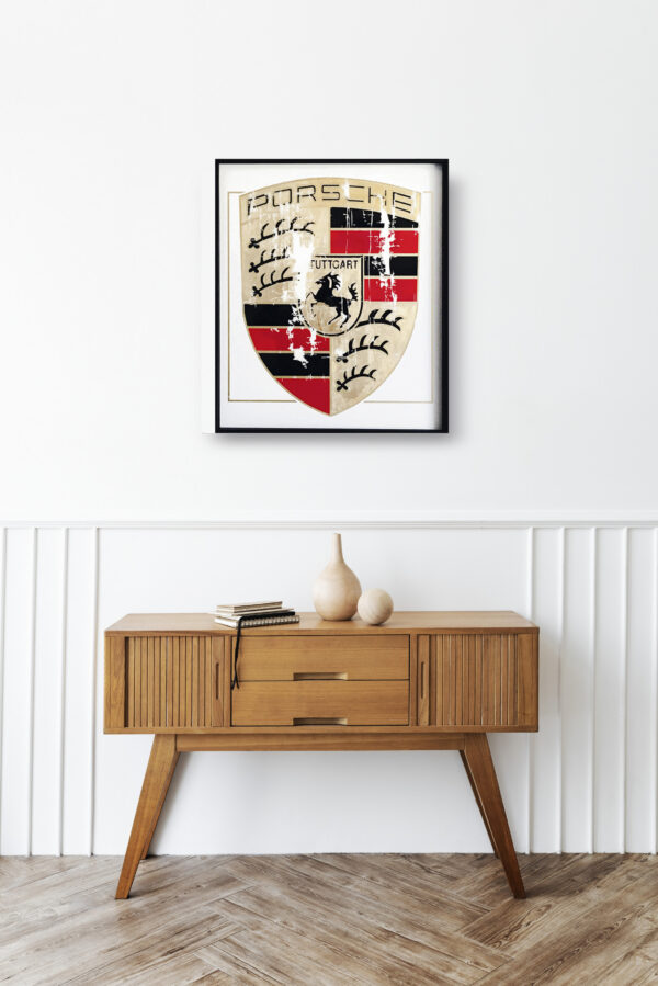 Wooden sideboard table with books and a vase Mod/001 - The Worn Gold Porsche's Emblem